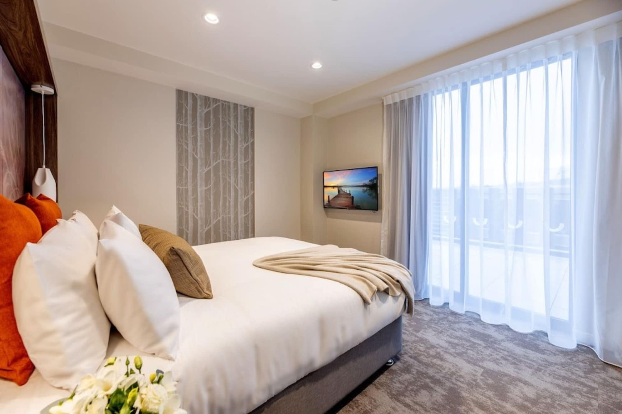 Sudima Christchurch City Ngoại thất bức ảnh A bedroom at the hotel