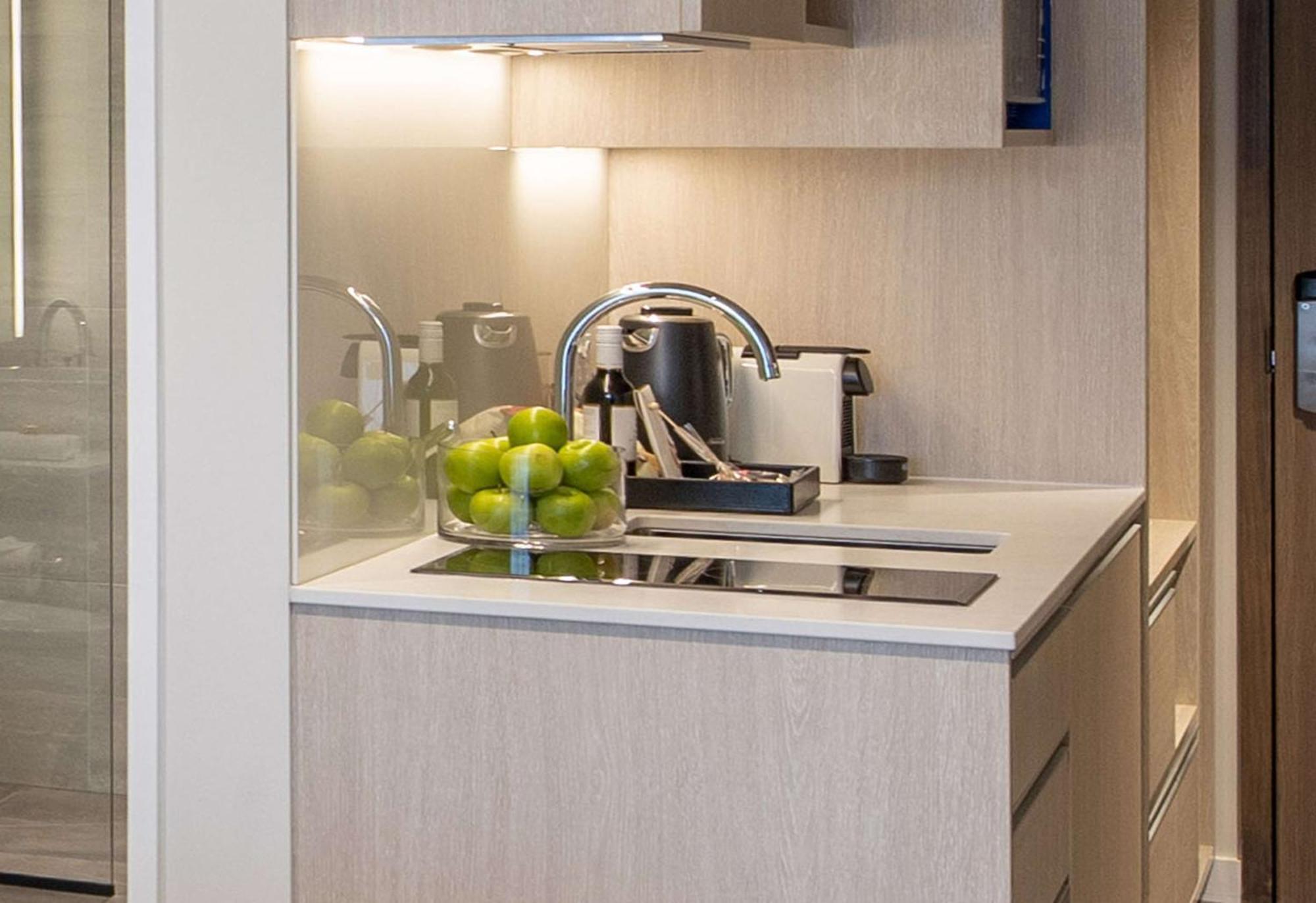 Sudima Christchurch City Ngoại thất bức ảnh A kitchen in a serviced apartment